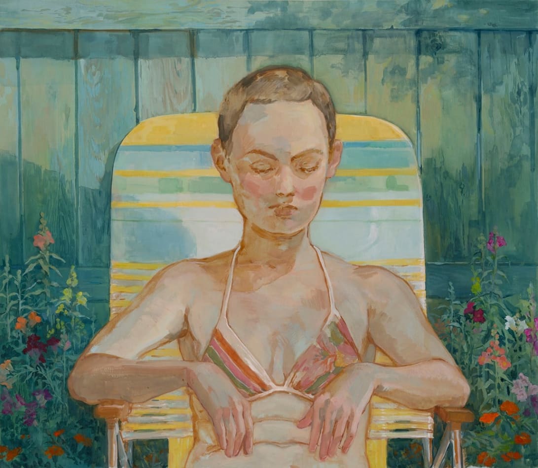 Painting of a woman in a lounge chair in a backyard with a wooden fence and red roses in the background. She is a stripped bikini top with her arms on the armrest of a yellow and blue stripped lounge chair.