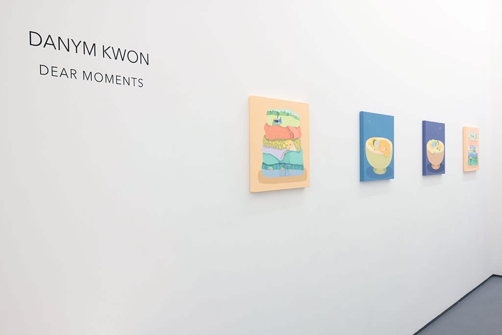 Whtite gallery wall with paintings by Danym Kwon