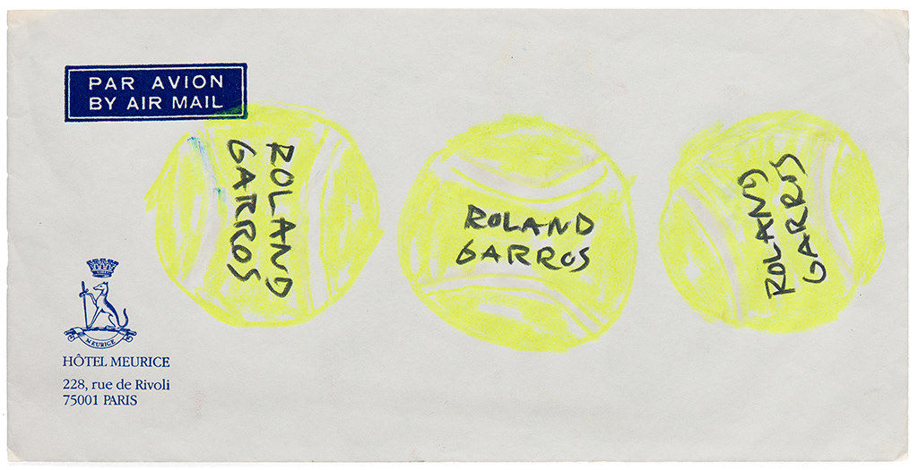 Drawing of three neon green tennis balls on the back of an envelope