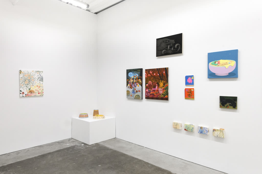 Installation view of a gallery wall with various artworks installed in a salon-style at Hashimoto Contemporary San Francisco