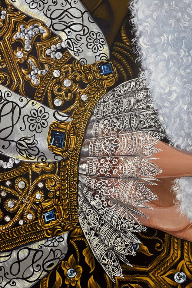 Detail photograph of the ornate fabric and lace cuff by Sabrina Bockler