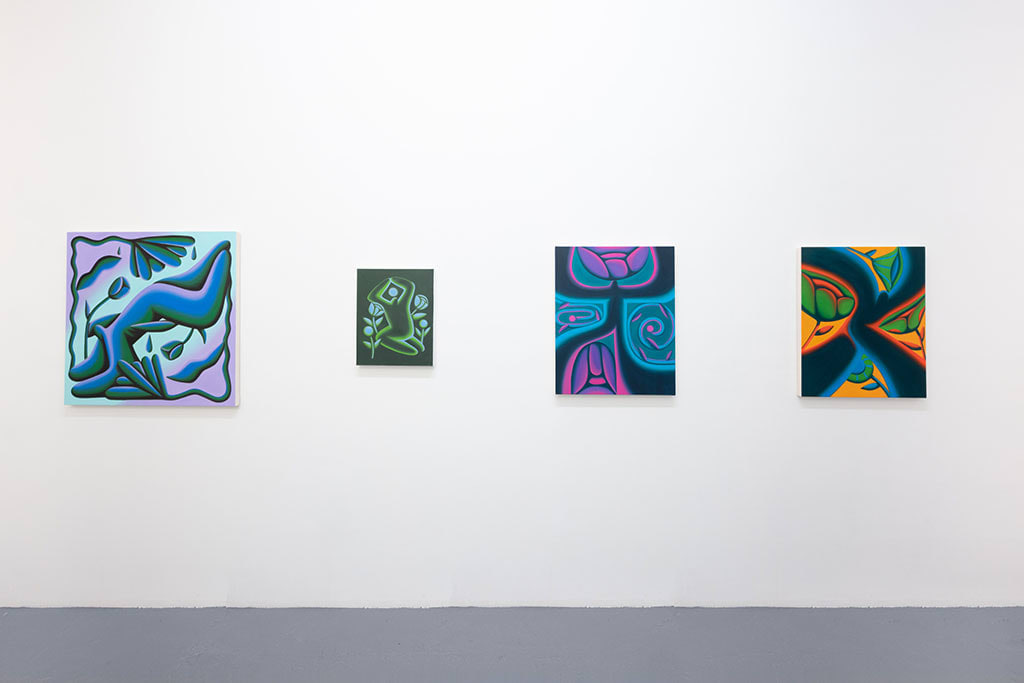 white gallery wall with four colorful paintings by Jocelyn Tsaih