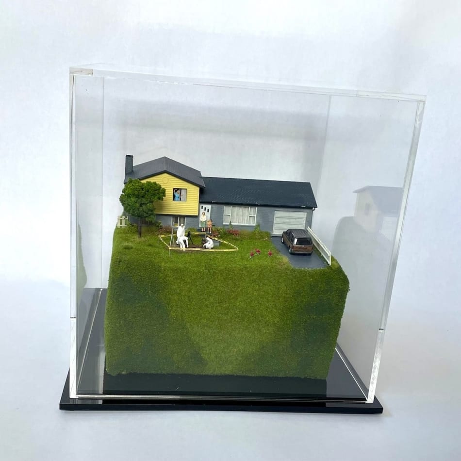 sculpture in glass case