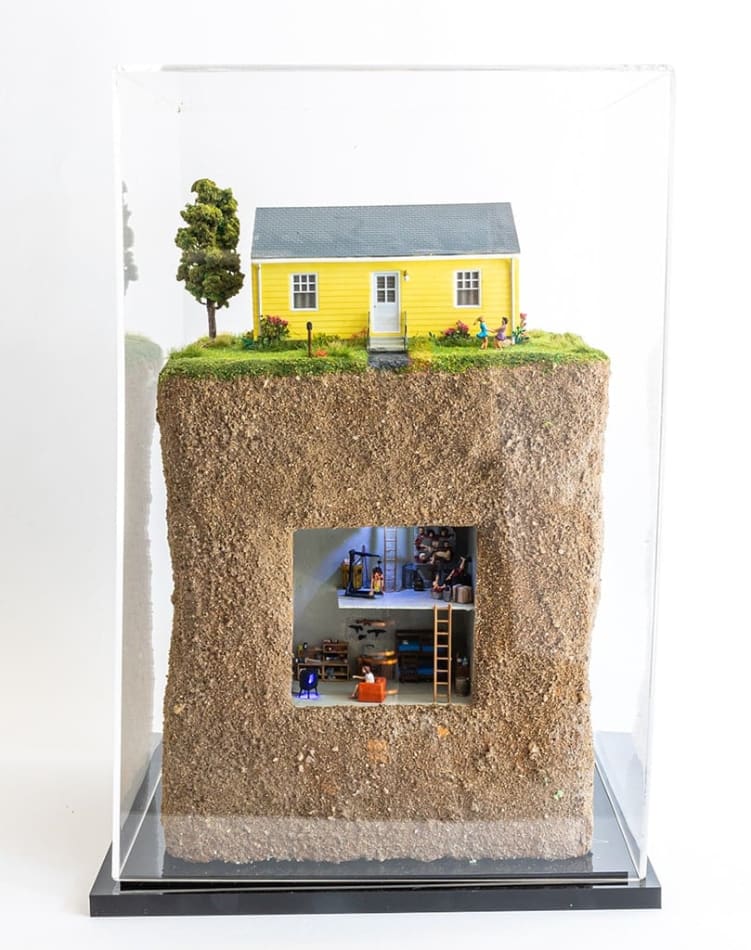 full view of artwork with glass case