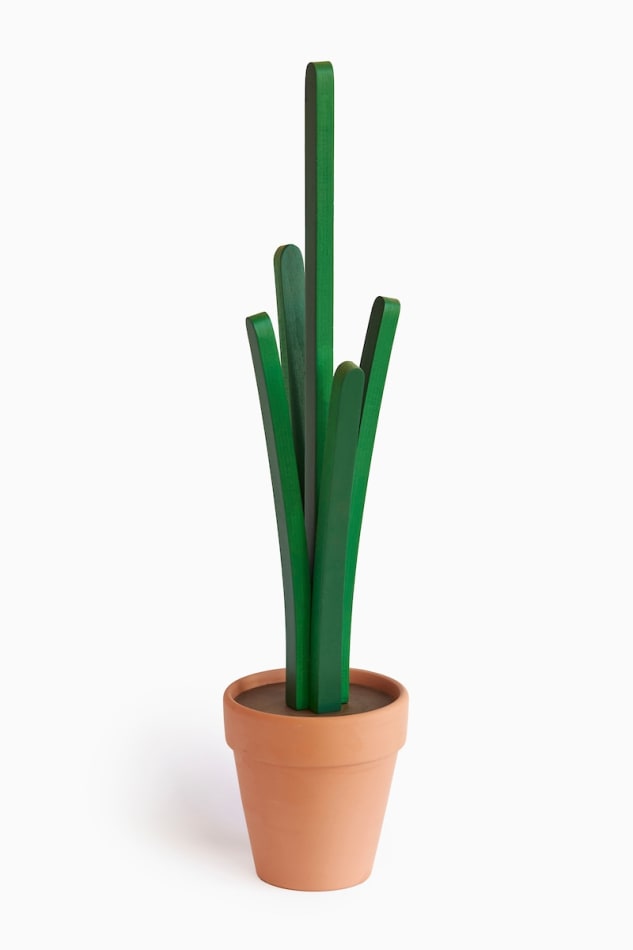 Jeff Canham wooden plant sculpture in a terra cotta pot