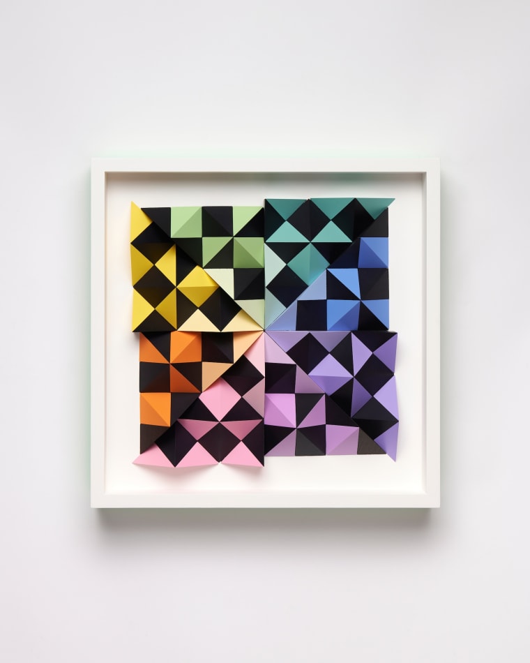 wooden wall sculpture with rainbow colors