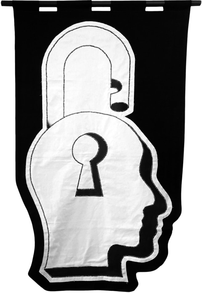 embroidered black and white banner of a padlock in the shape of a human head