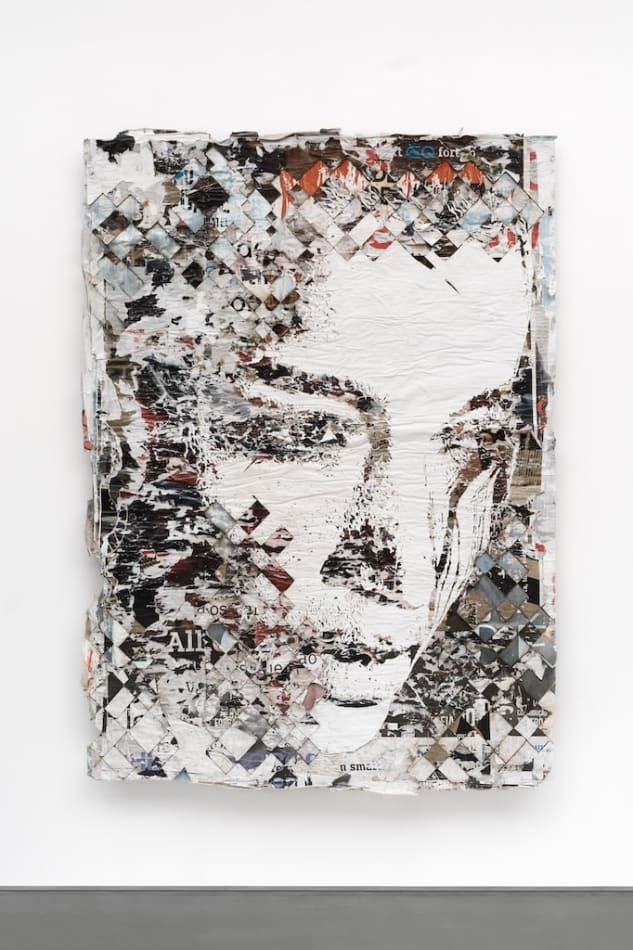 Paper collage of a silhouette of a woman's face by Vhils