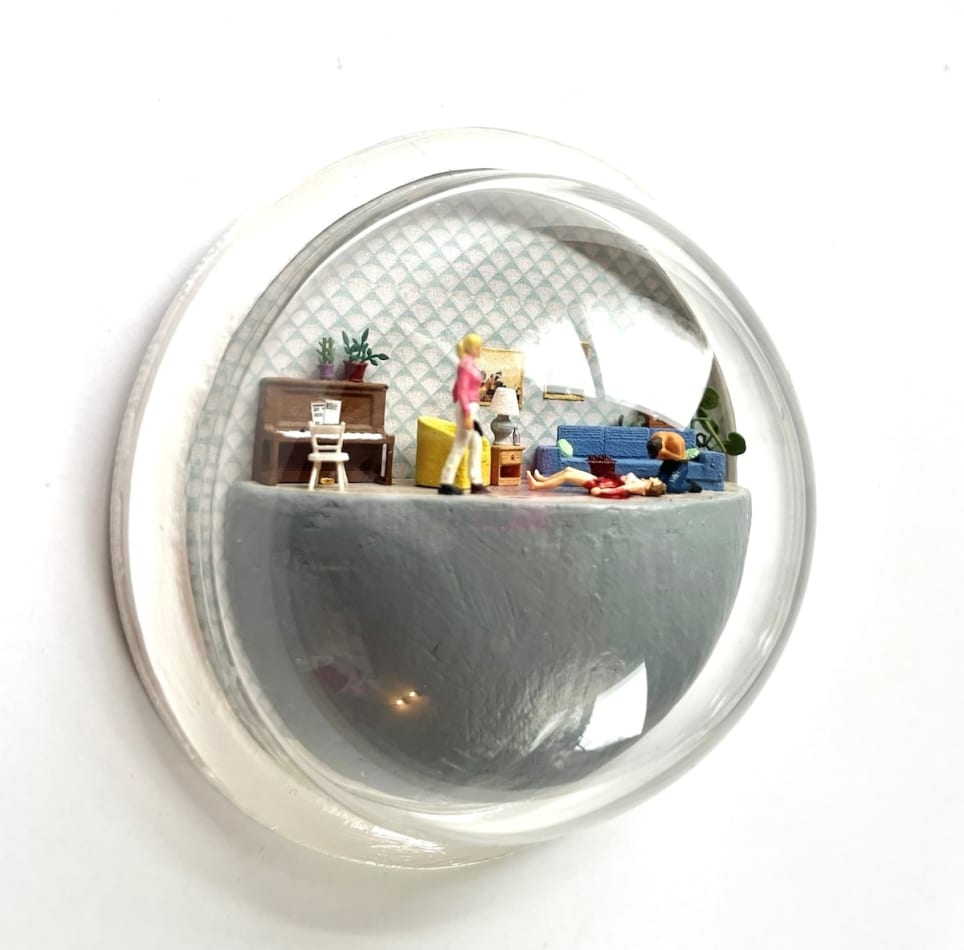 sculpture in glass case