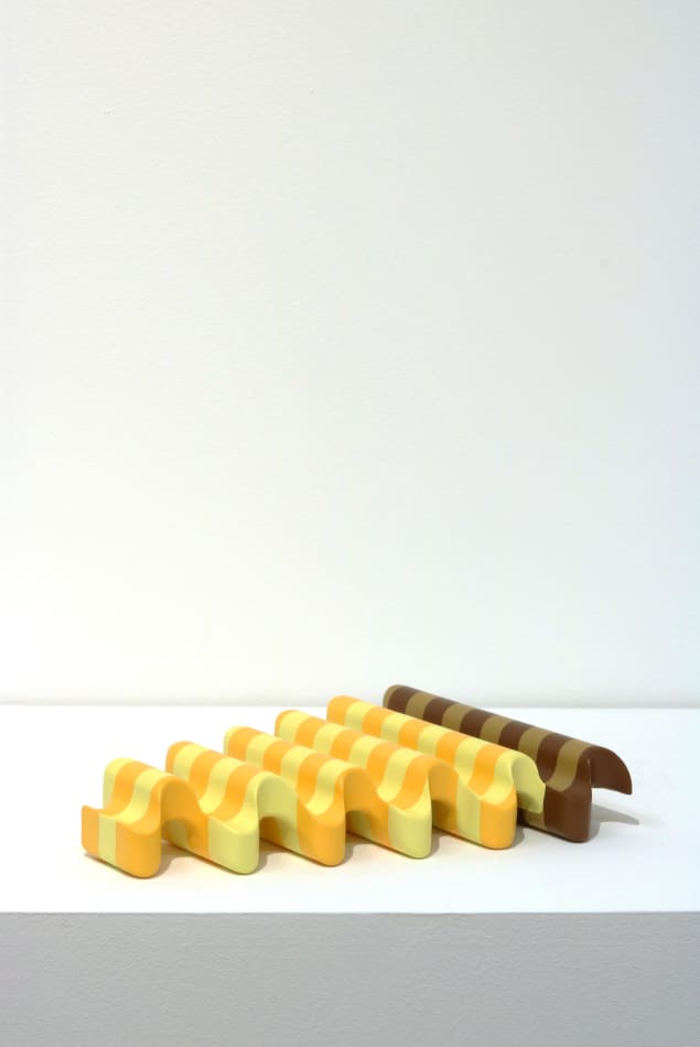 abstracted sculpture of a slice of pizza