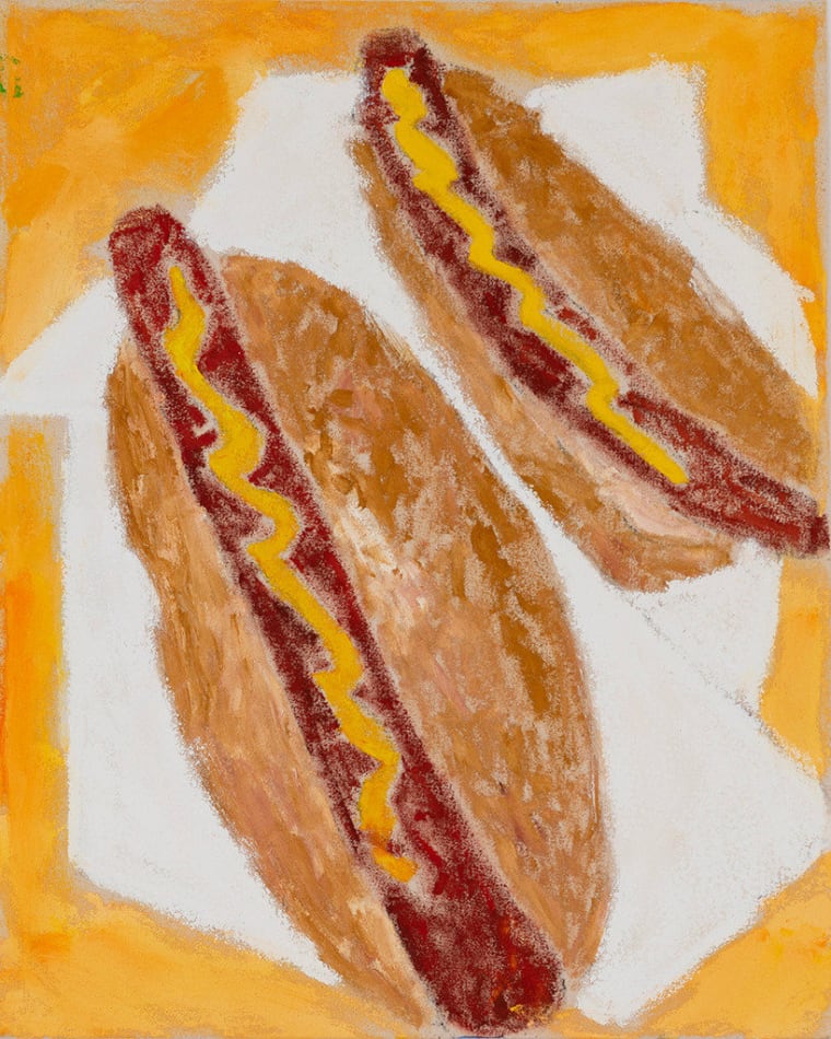 two hot dogs on a pile of napkins