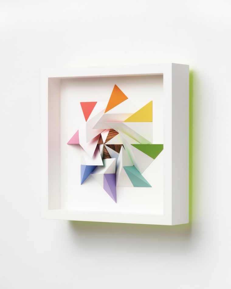 wooden geometric wall sculpture by Sean newport - rainbow