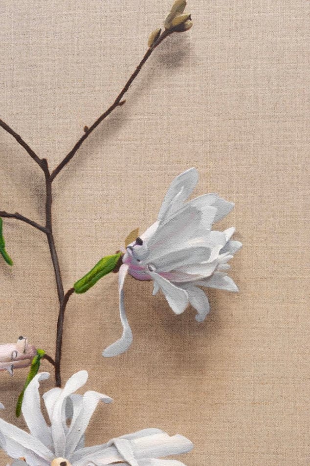 detail of painting of white flowers with subtle dog faces