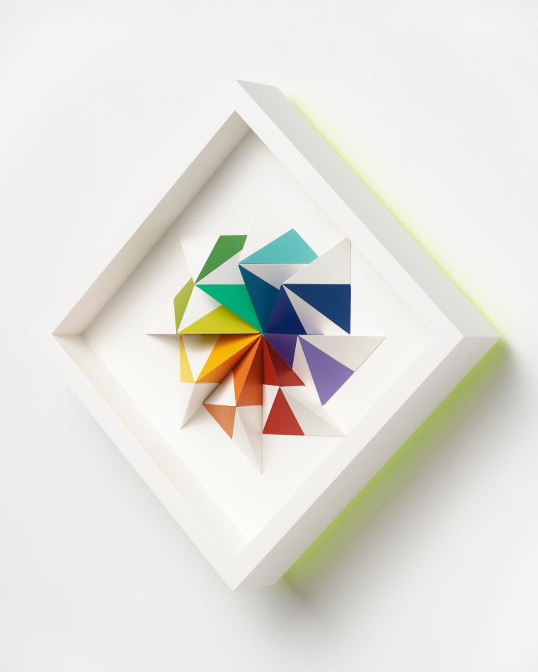 wooden geometric wall sculpture by Sean newport - rainbow