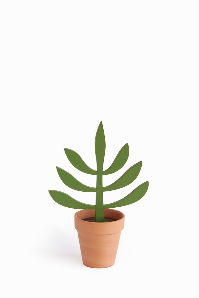 Jeff Canham wooden plant sculpture in a terra cotta pot