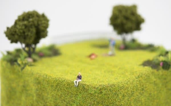 miniature of a person burying a body