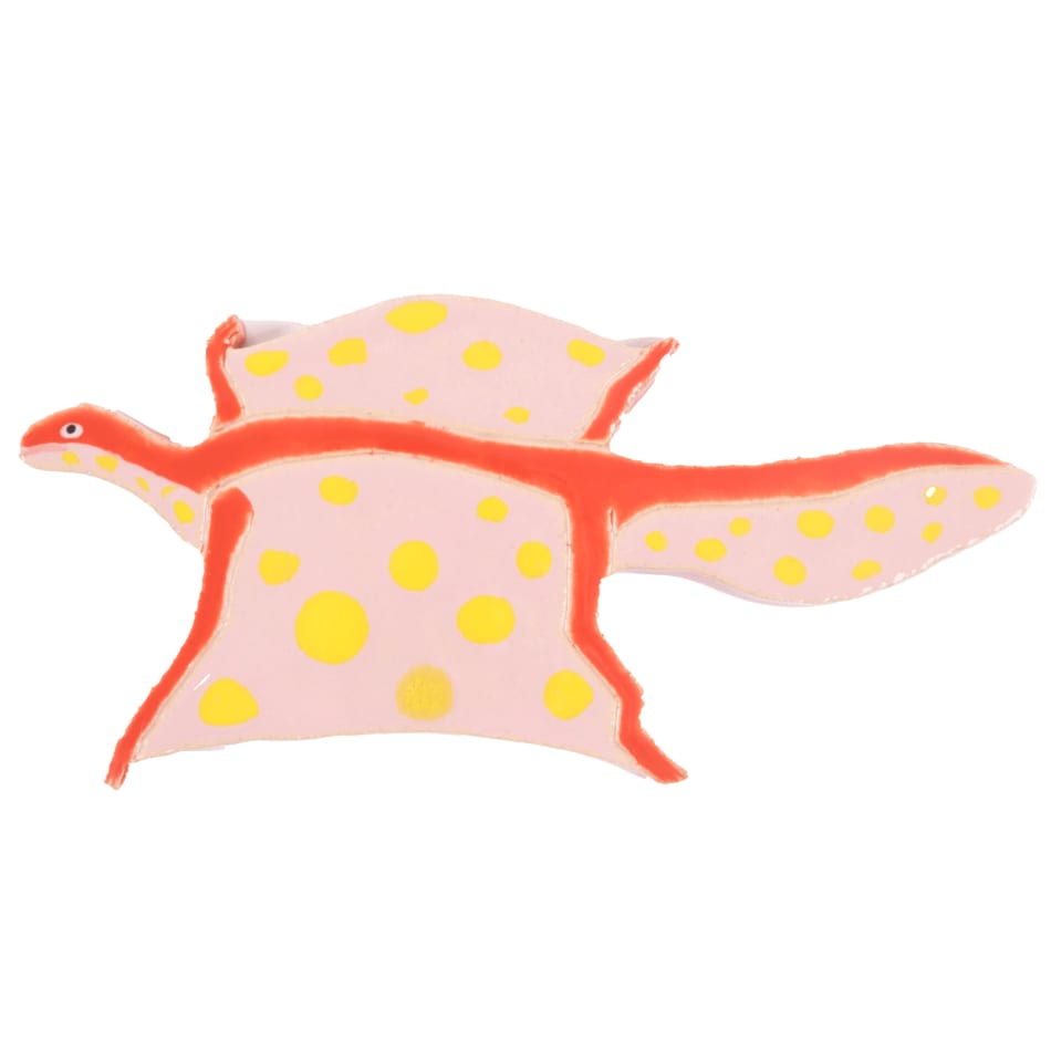 ceramic wall hanging of a red flying lizard