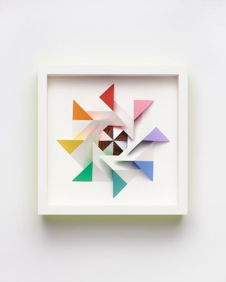 wooden geometric wall sculpture by Sean newport - rainbow
