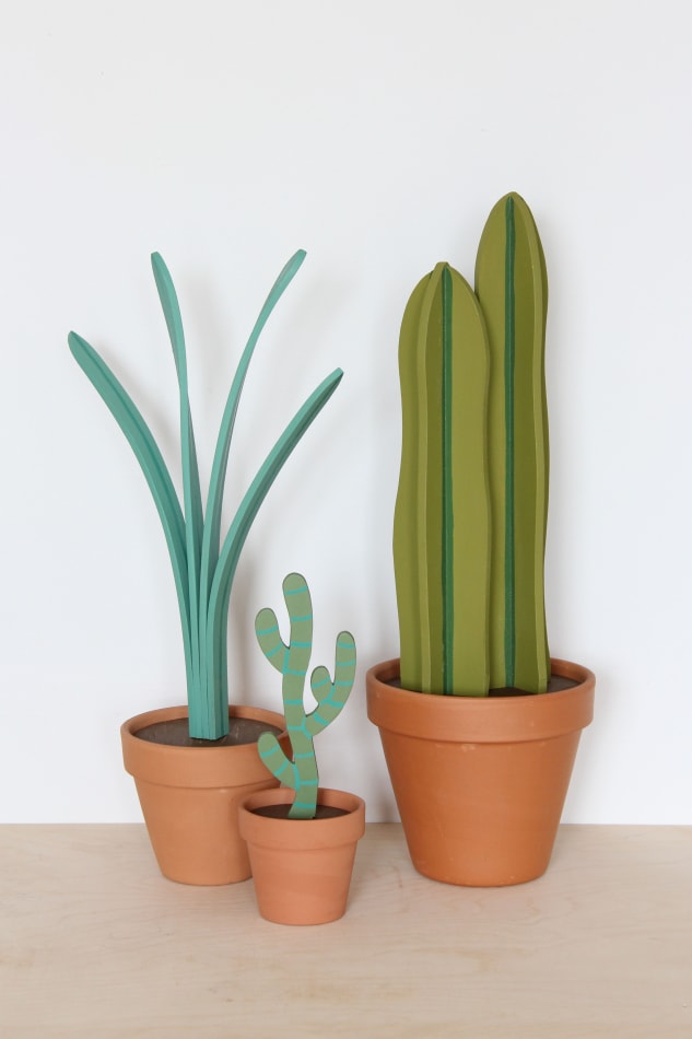 Jeff Canham wooden plant sculpture in a terra cotta pot