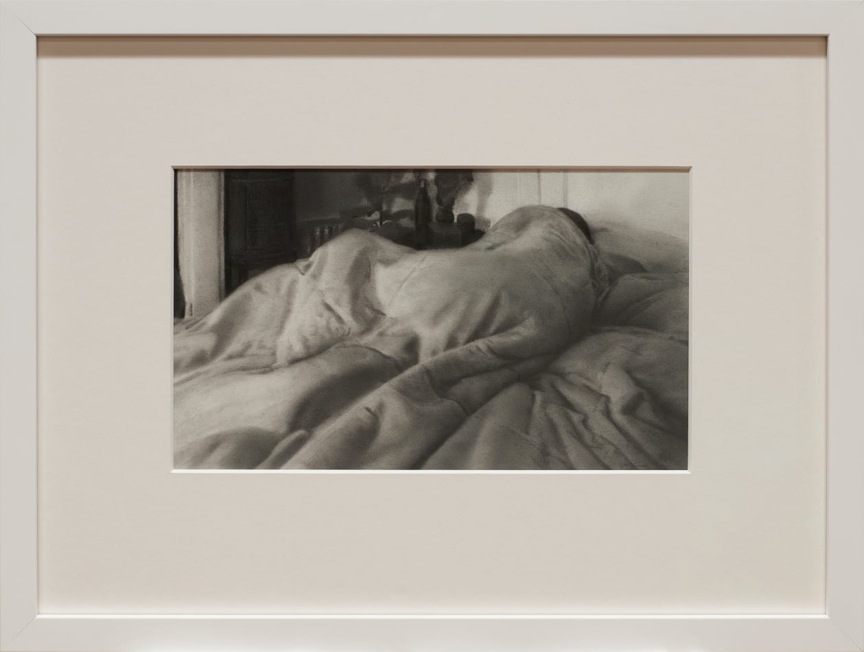 drawing of a person wrapped in blankets