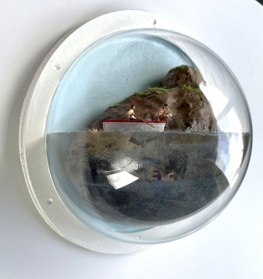 sculpture in glass case