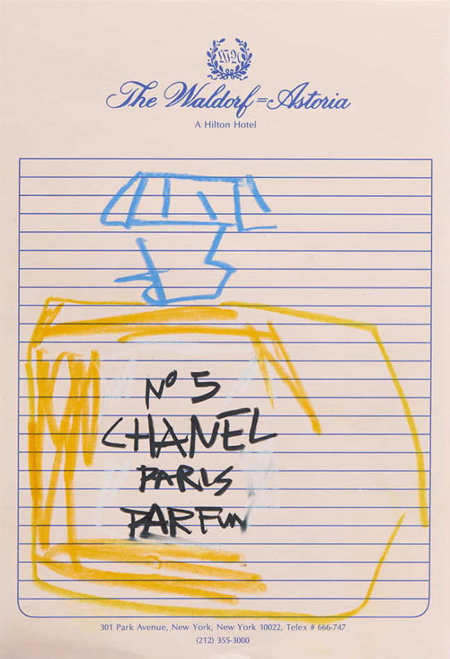 Drawing of a bottle of Chanel No.5 perfume on hotel stationery