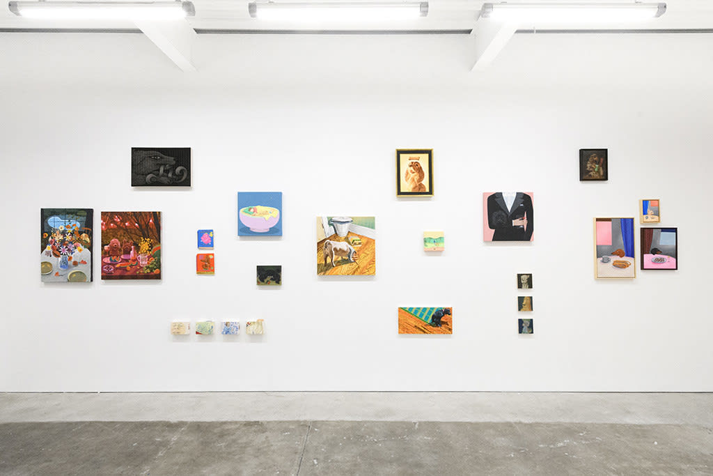 Installation view of a gallery wall with various artworks installed in a salon-style at Hashimoto Contemporary San Francisco