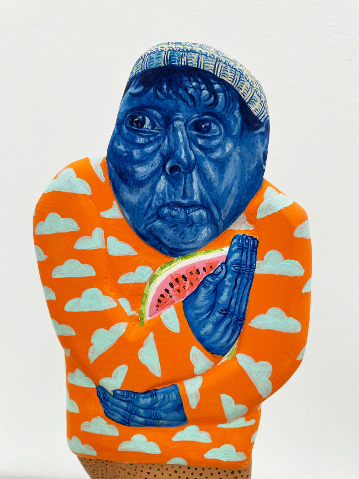 Close up view of the blue face side of the sculpture