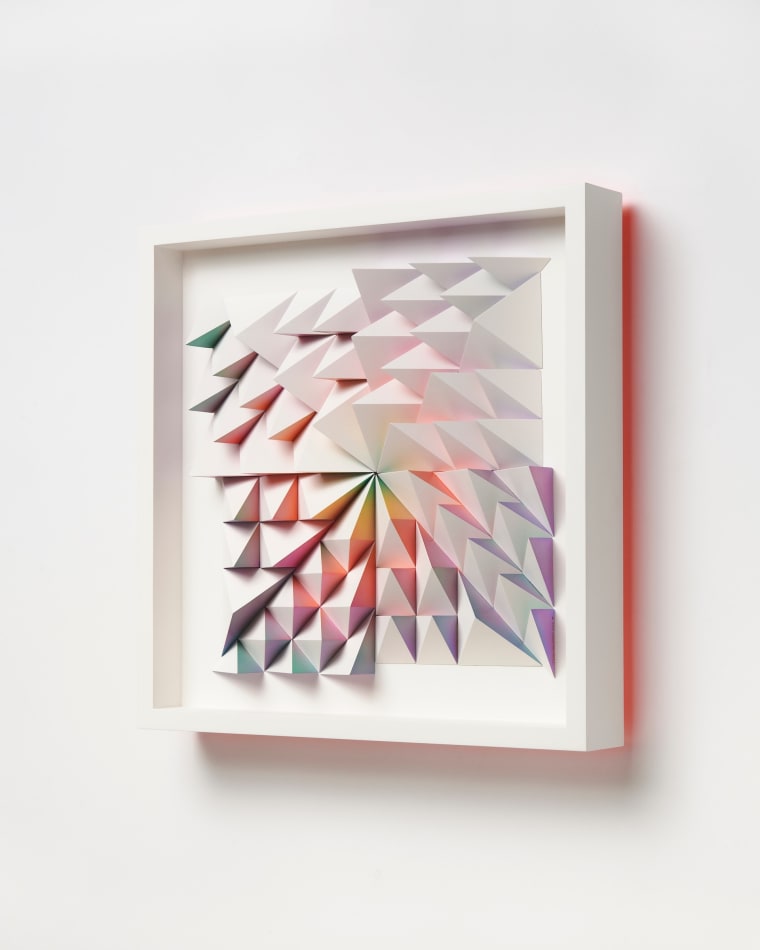 wooden wall sculpture with rainbow colors