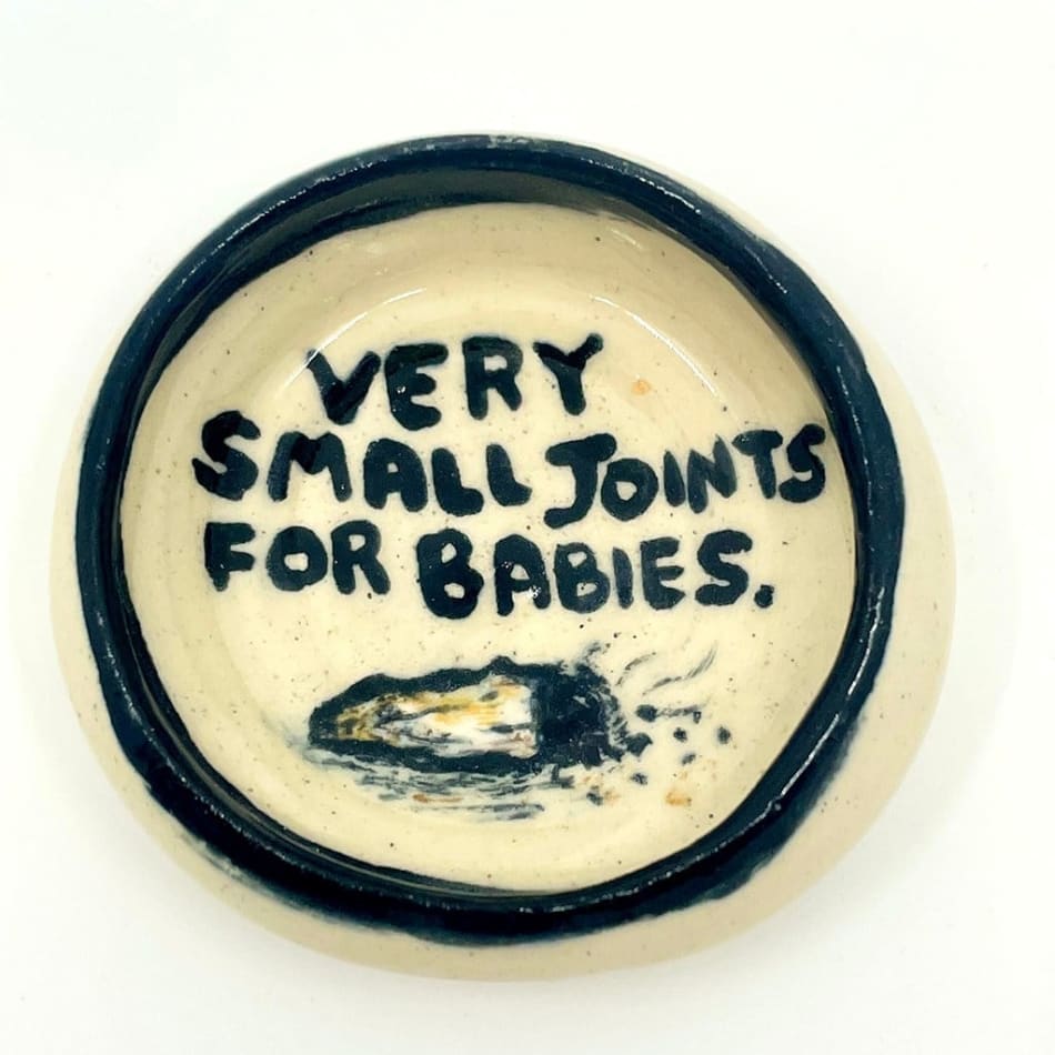 Dave Zackin's small dish with a joint painted on in black