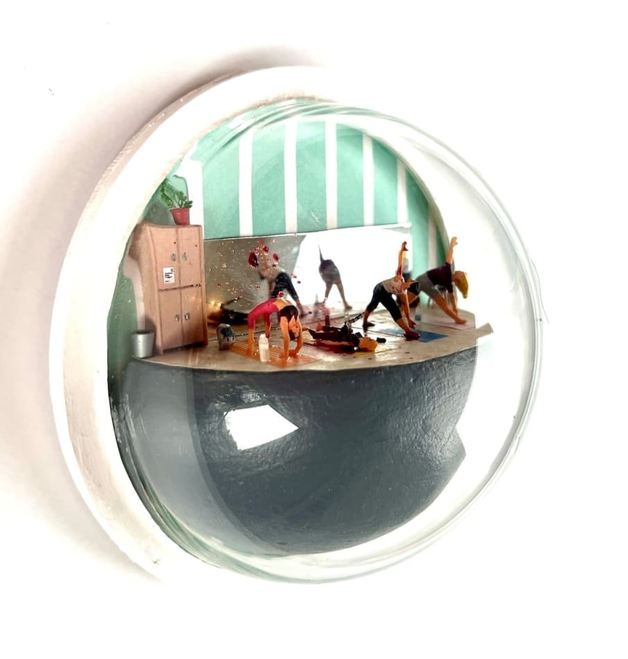 sculpture in glass case
