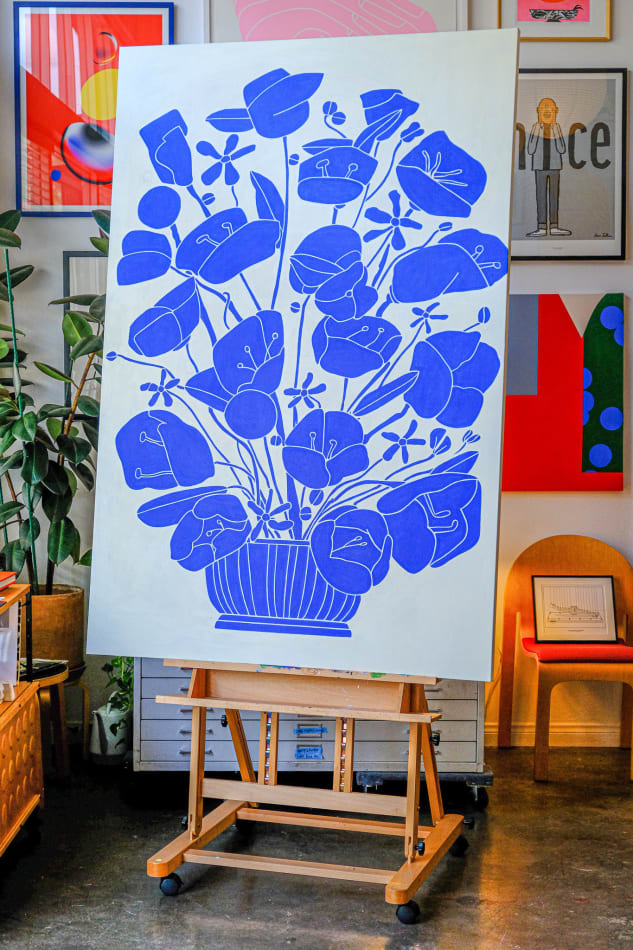 Painting of blue flowers in a vase on a white background by Sebastian Curi