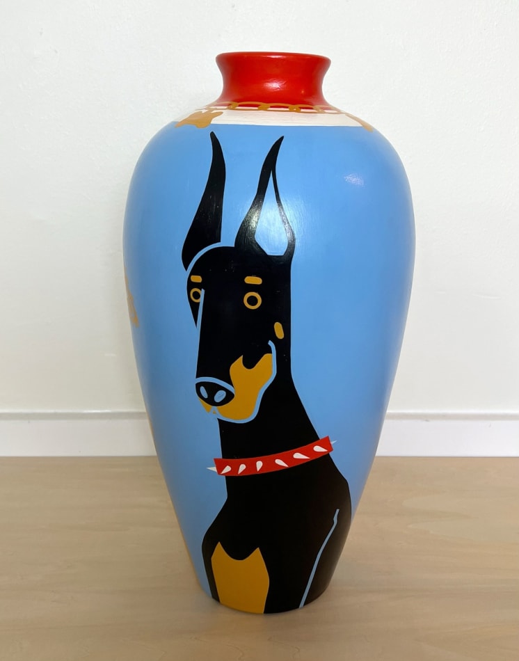Jillian Evelyn - Sculpture of repurpose vase painted with dogs, blue background, red top