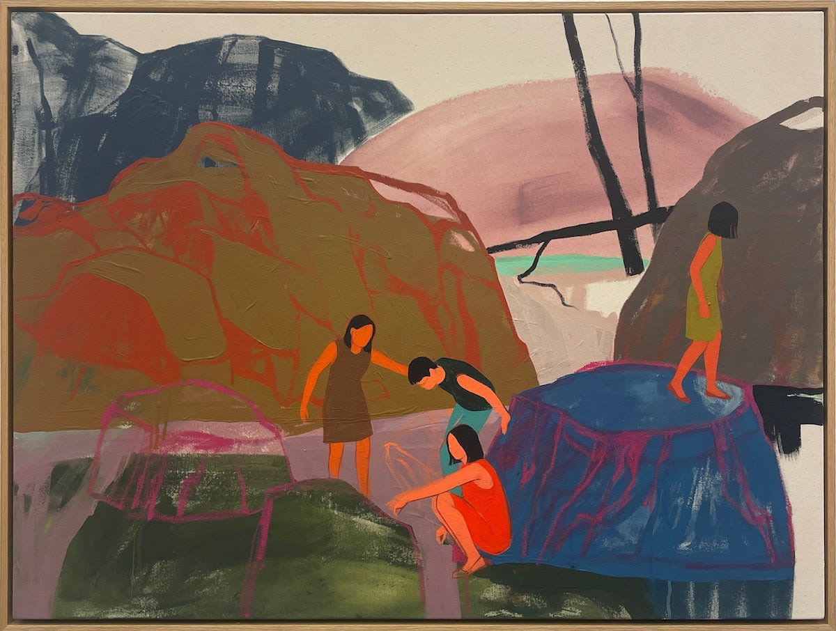 framed painting of 4 people climbing among various colored rocks