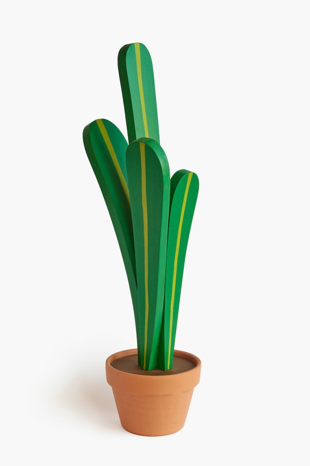 Jeff Canham wooden plant sculpture in a terra cotta pot