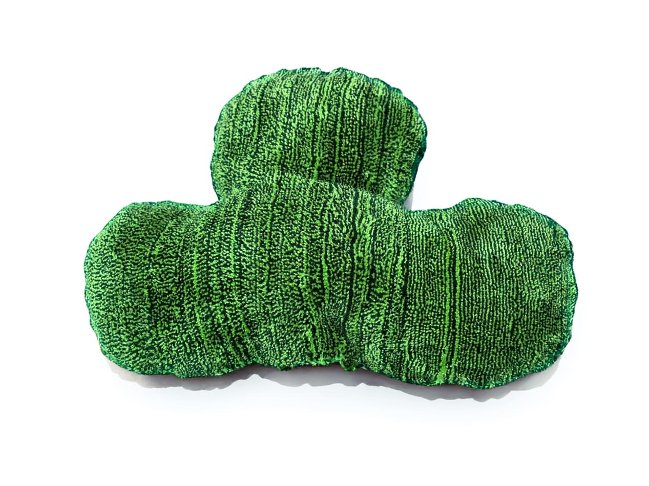Sculpture of large leaf, pillow, light green