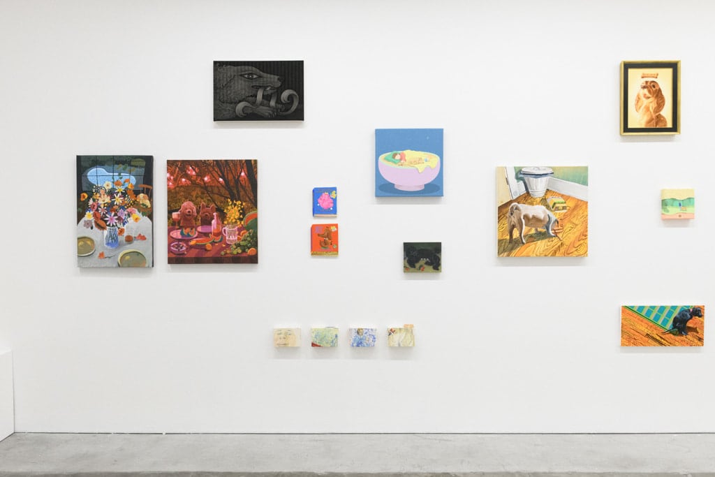Installation view of a gallery wall with various artworks installed in a salon-style at Hashimoto Contemporary San Francisco