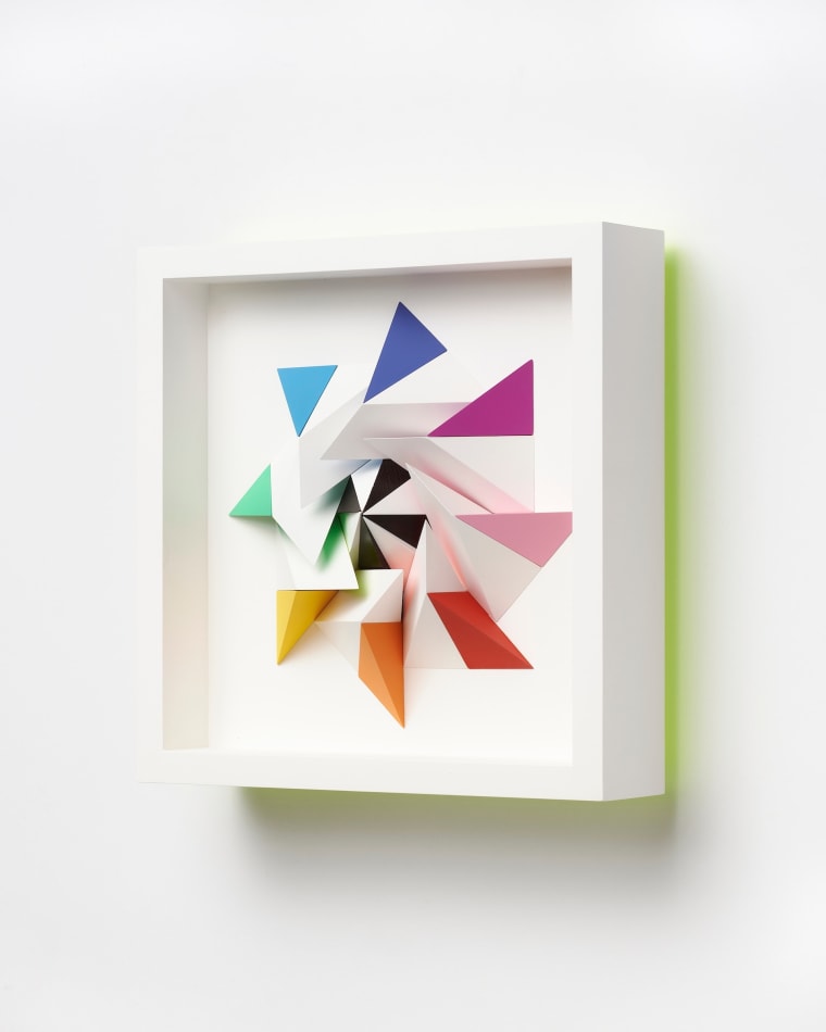 wooden geometric wall sculpture by Sean newport - rainbow