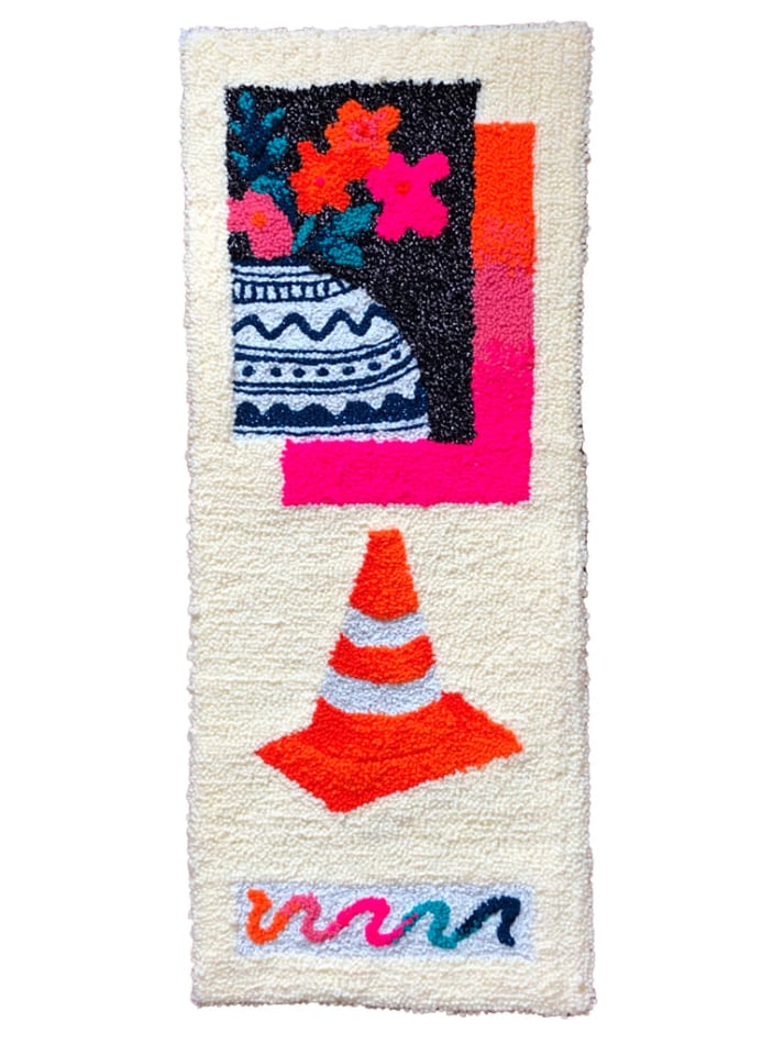 Aliyah Salmon's carpet like work of a vase and an orange traffic cone