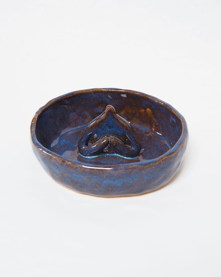 Jocelyn Tsaih's sculpture of a blue bowl with a face the middle