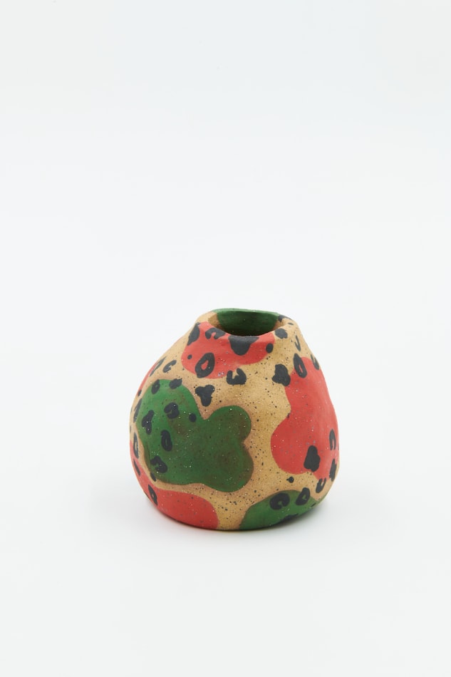 Jackie Brown small ceramic pinch put with green and pink pattern painted on as well as leopard print