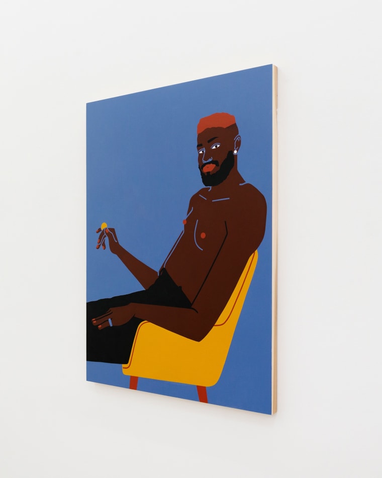 Man with red hair sitting in yellow chair holding a coin by Jillian Evelyn