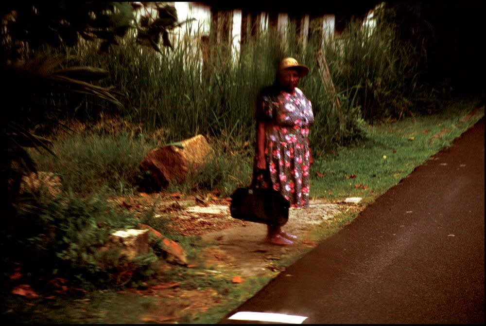Ohad Maiman, Woman by Road (Seychelles), 2004