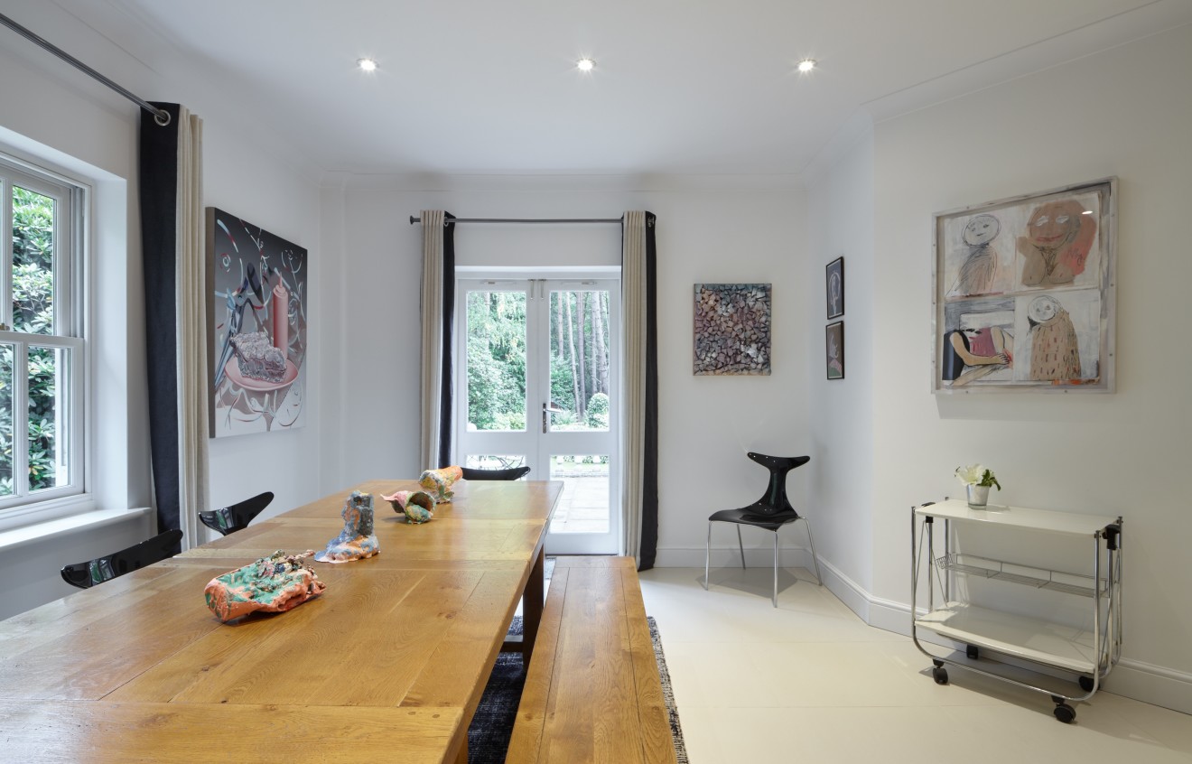 Left to right: Painting by Jane Hayes Greenwood, sculptures on table by Rosie Reed, painting by Adham Faramawy, drawings by Nel Aerts and painting by Megan Rooney.