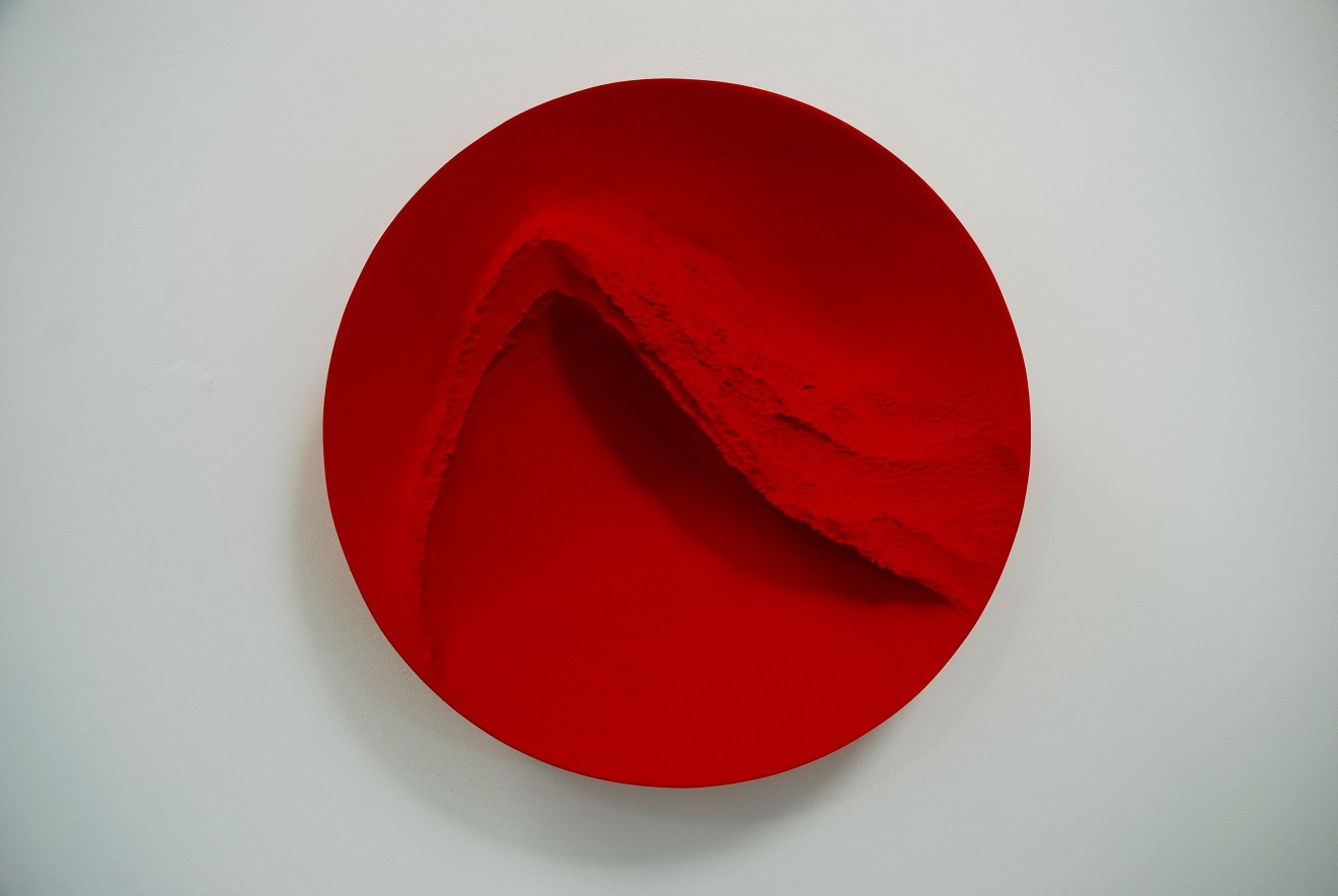 Red Wind, pigment on carved wood, 54 cm diameter