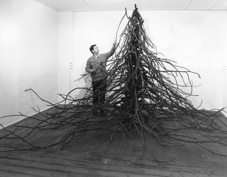 David Nash installing Black Column in the Sticks in 1986