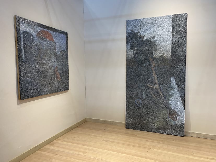 Installation of two Wilmer Wilson IV pieces made of a photograph on wood covered in thousands of staples