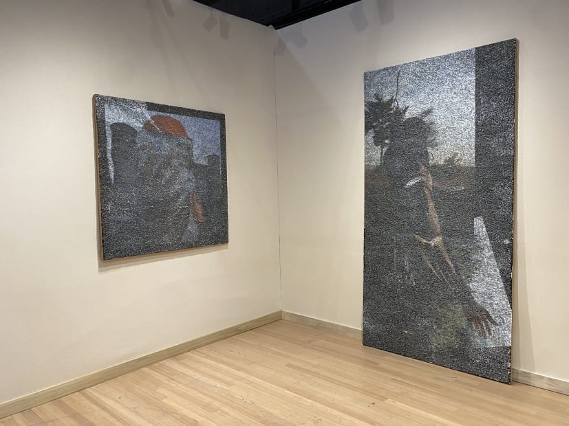 Installation of two Wilmer Wilson IV pieces made of a photograph on wood covered in thousands of staples