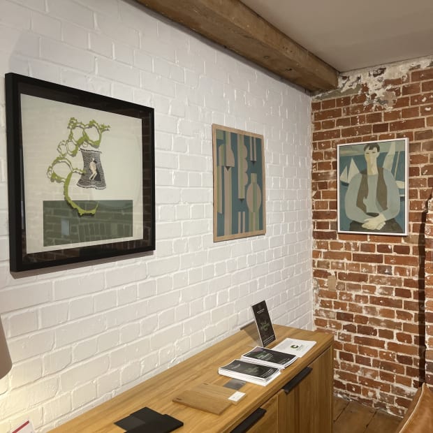 From left: framed works by Ruth Howes, Suzi Joel and Ann Payne