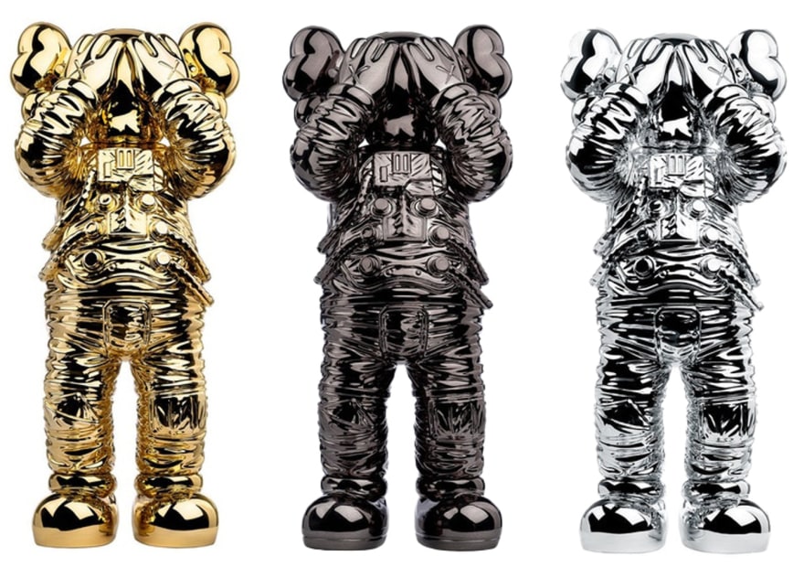 kaws holiday space figure gold black silver set